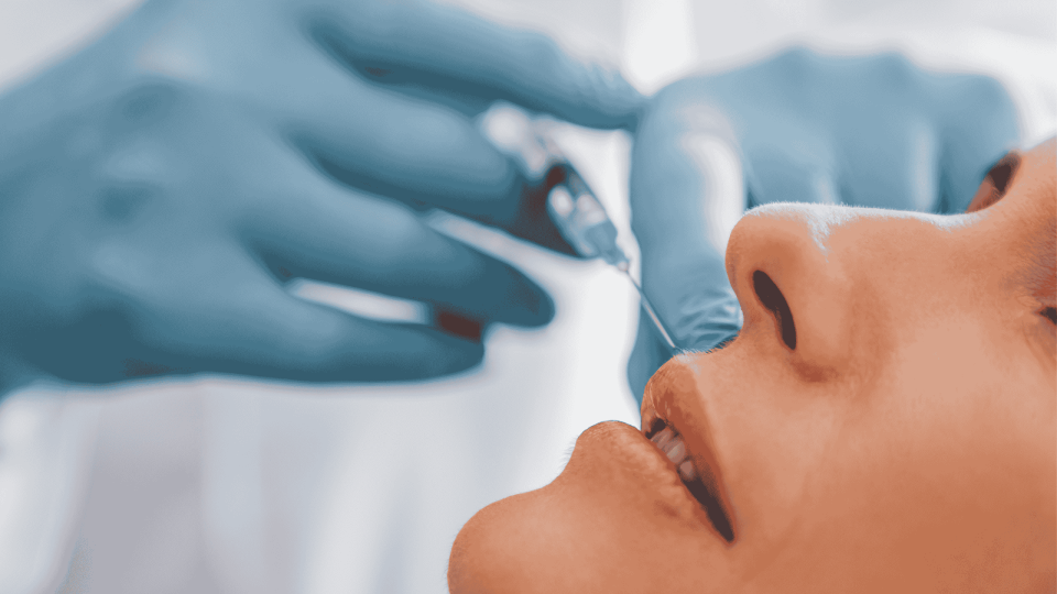 lady getting dermal fillers from a professional