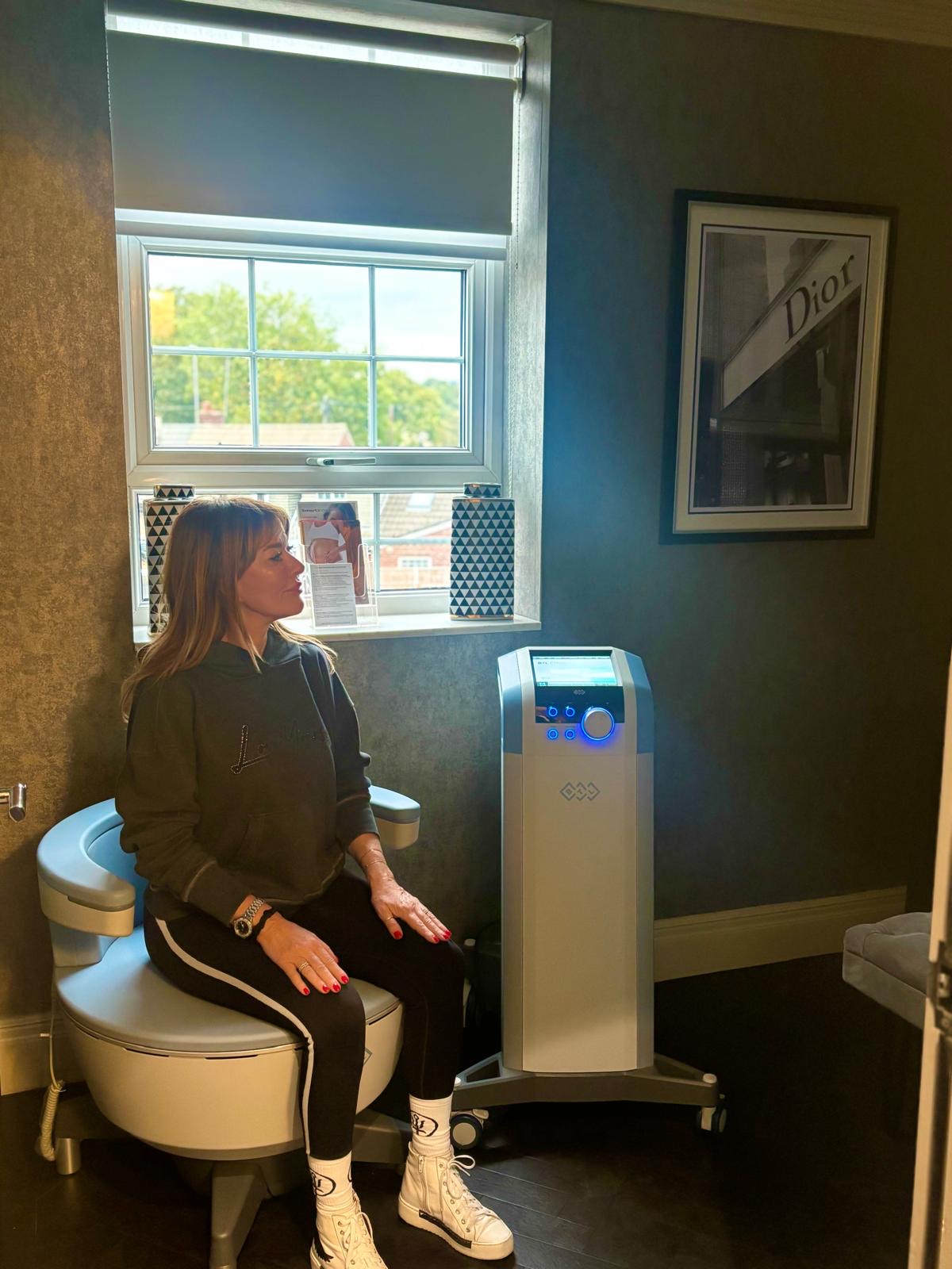 lady using emsella pelvic floor chair